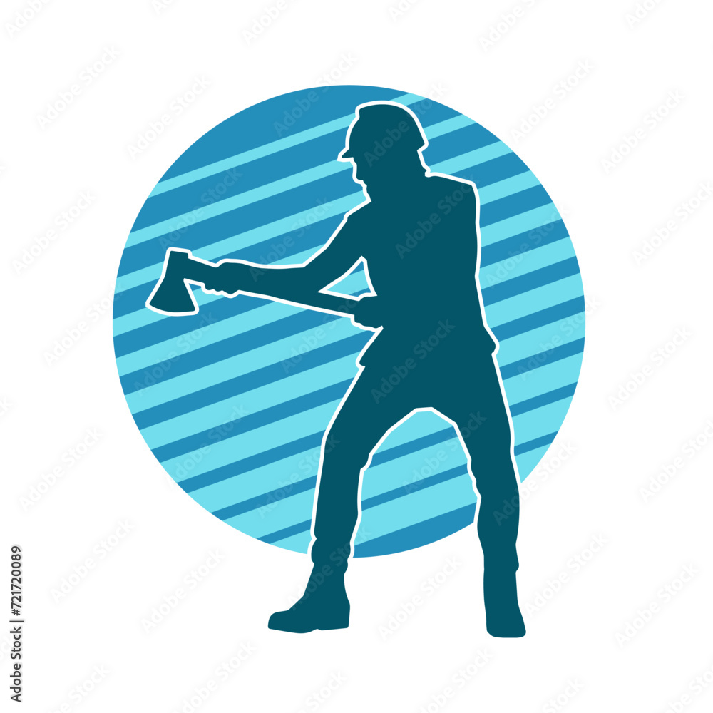Silhouette of a worker in action pose using his axe tool. Silhouette of a worker in action pose using his axe tool.