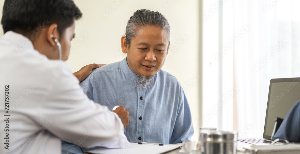 Asian man doctor service help support discussing and consulting talk to asian sick senior man patient at meeting health medical care trust concept in hospital.healthcare and medicine Asian man doctor service help support discussing and consulting talk to asian sick senior man patient at meeting health medical care trust concept in hospital.healthcare and medicine