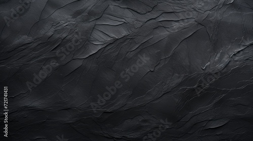 Dark elegance: intricate black paper texture background for creative design projects 