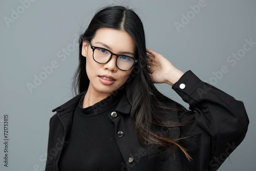 Business woman face studio portrait student beautiful smile background cute asian fashion beauty attractive glasses