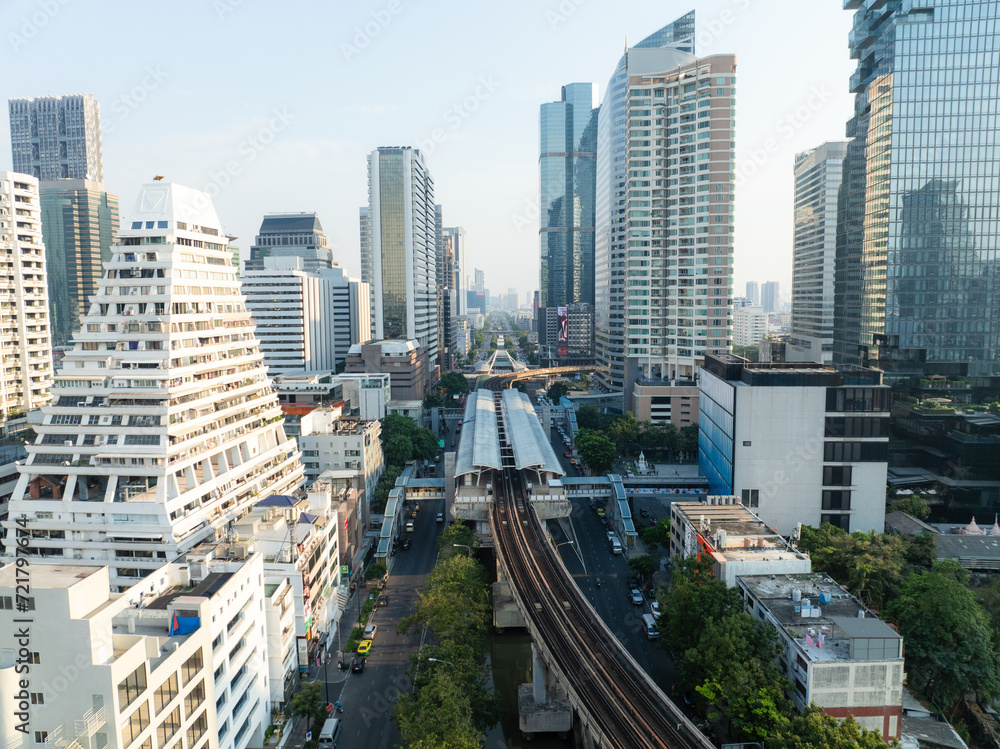 Fototapeta premium Aerial view Silom city building with BTS skytrain