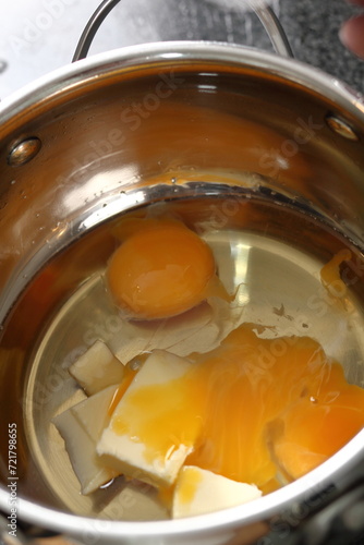 White Wine, Butter and Egg Yolk in Saucepan