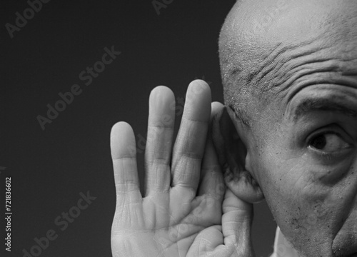 deafness suffering from hearing loss on grey black background with people stock image stock photo 