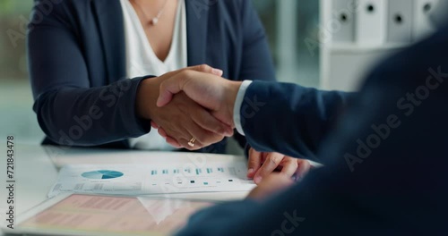 Business people, negotiation and handshake for deal, agreement or partnership in office. Shaking hands, closeup and hiring offer for recruitment, b2b collaboration or data analyst at table in meeting photo