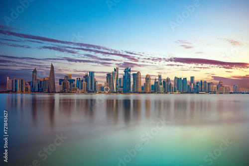 The Panoramic skyline of Doha, Qatar during sunset sunrise