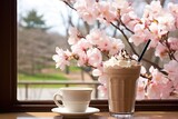 Mocha frappe with a view of a Japanese rock garden in spring.