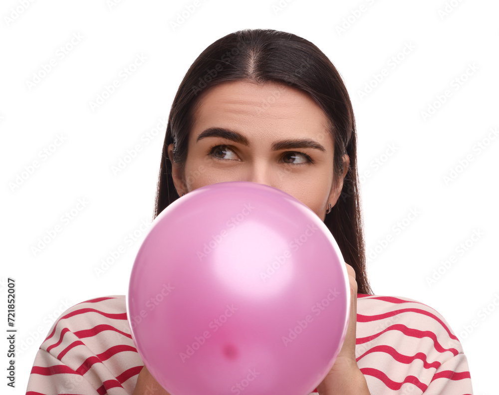 Woman inflating pink balloon on white background Woman inflating pink balloon on white background