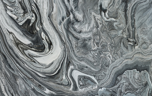 art photography of abstract marbleized effect background with black, gray and white creative colors. Beautiful paint.