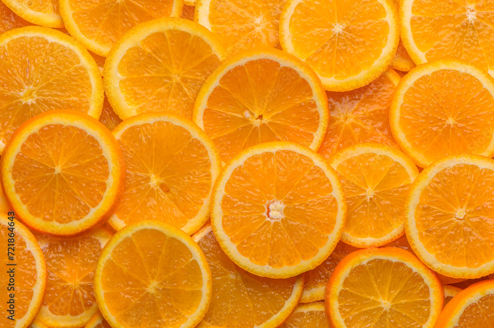 oranges cut into slices and laid out on the table as a food background 4 oranges cut into slices and laid out on the table as a food background 4