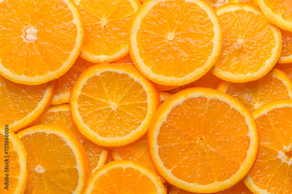 oranges cut into slices and laid out on the table as a food background 6 oranges cut into slices and laid out on the table as a food background 6