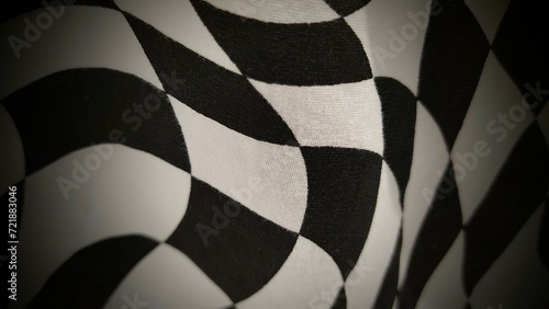 black and white checkered flag © Boontian