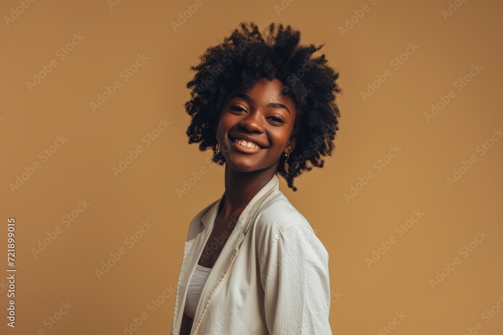 Happy successful black business woman in studio portrait. Happy successful black business woman in studio portrait.
