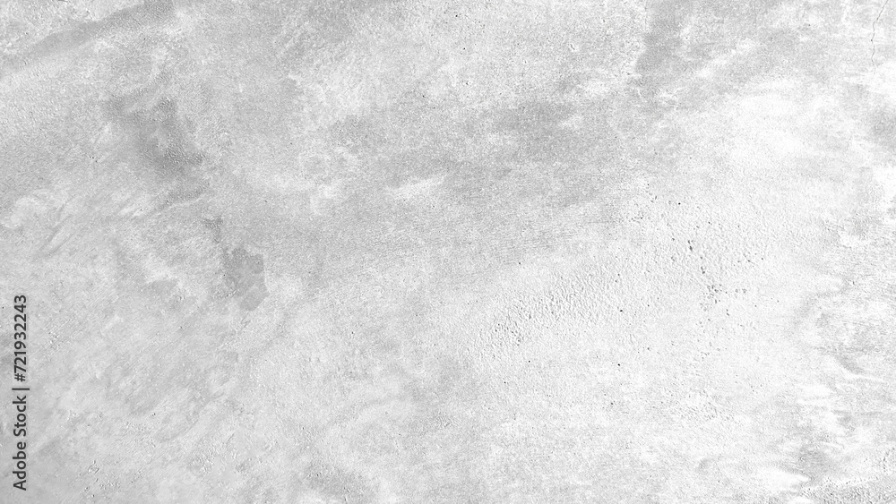 The light-colored cement wall has cracks. The light-colored cement wall has cracks.