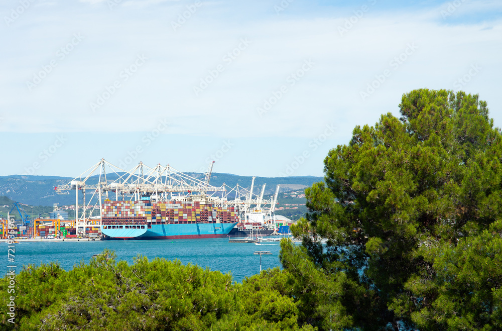 Large cargo ship docked at mediterranean sea