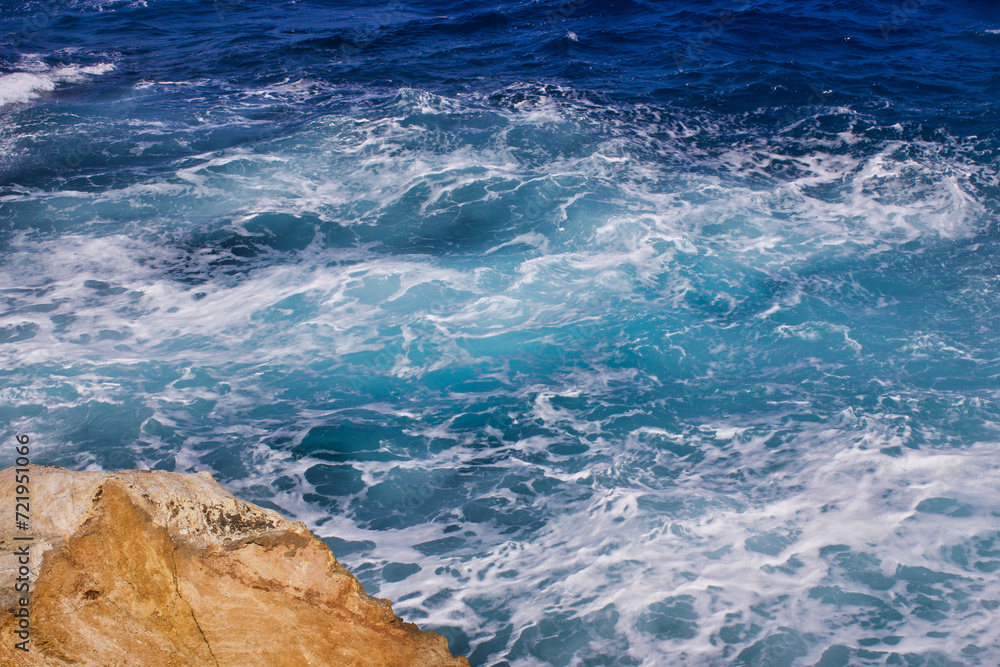 Fototapeta premium Beautiful Aegean Sea off the coast of Naxos, limestone rocks before the entering Zeus Bay 