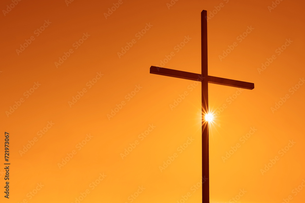 Silhouettes of crucifix symbol on top mountain with bright sunbeam on tyellow, orange sky background. metal, iron Cross on a Hill at sunset. Black sea, Georgia, Batumi. sun rays. Sunrays. Silhouettes of crucifix symbol on top mountain with bright sunbeam on tyellow, orange sky background. metal, iron Cross on a Hill at sunset. Black sea, Georgia, Batumi. sun rays. Sunrays.