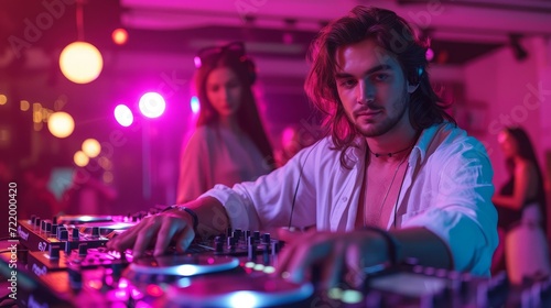 Nightclub DJ Mixing Electronic Dance Music with Headphones