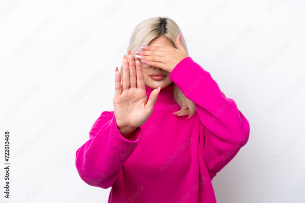Young Russian woman isolated on white background making stop gesture and covering face Young Russian woman isolated on white background making stop gesture and covering face