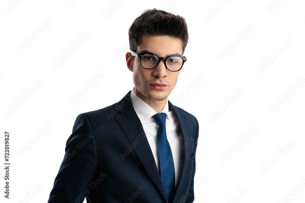 intelligent elegant man with glasses in navy blue suit looking forward intelligent elegant man with glasses in navy blue suit looking forward