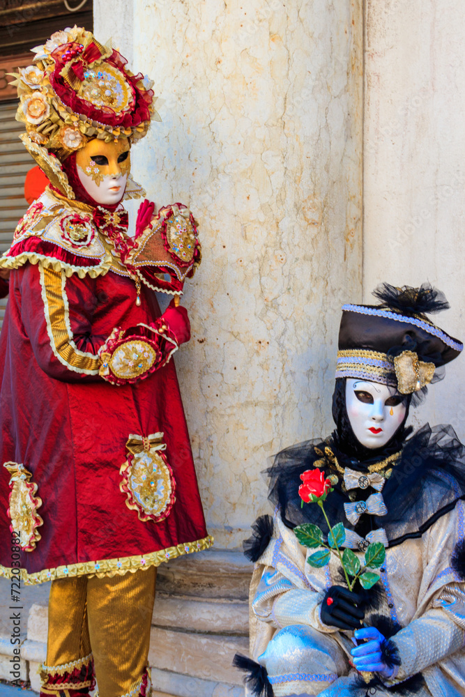 Two venetian masks during the annual Venice Carnival in Venice, Italy
