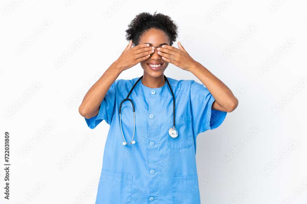 Young surgeon African American doctor woman isolated on white background covering eyes by hands Young surgeon African American doctor woman isolated on white background covering eyes by hands