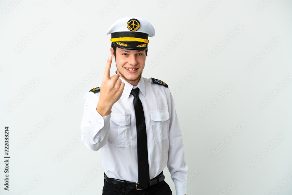 Airplane Russian pilot isolated on white background doing coming gesture Airplane Russian pilot isolated on white background doing coming gesture