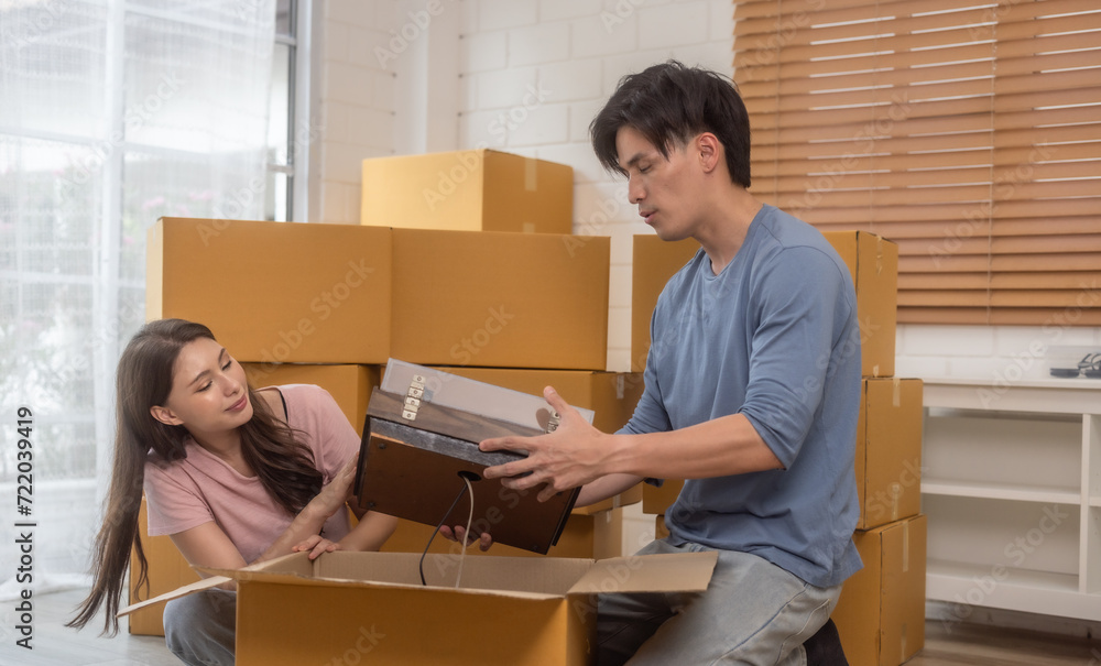 Couple Content with Successful Moving Service. Couple Content with Successful Moving Service.