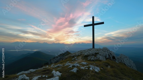 a large cross on the top of the mountain