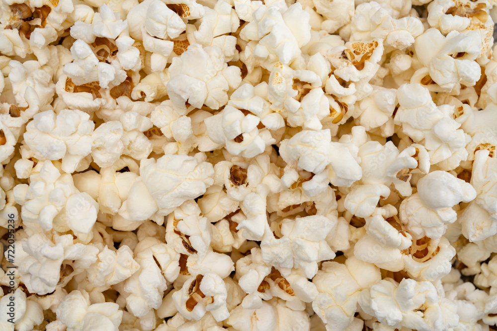 Salted popcorn in glass bowl Salted popcorn in glass bowl