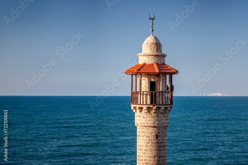 Minaret by the sea in asunny day