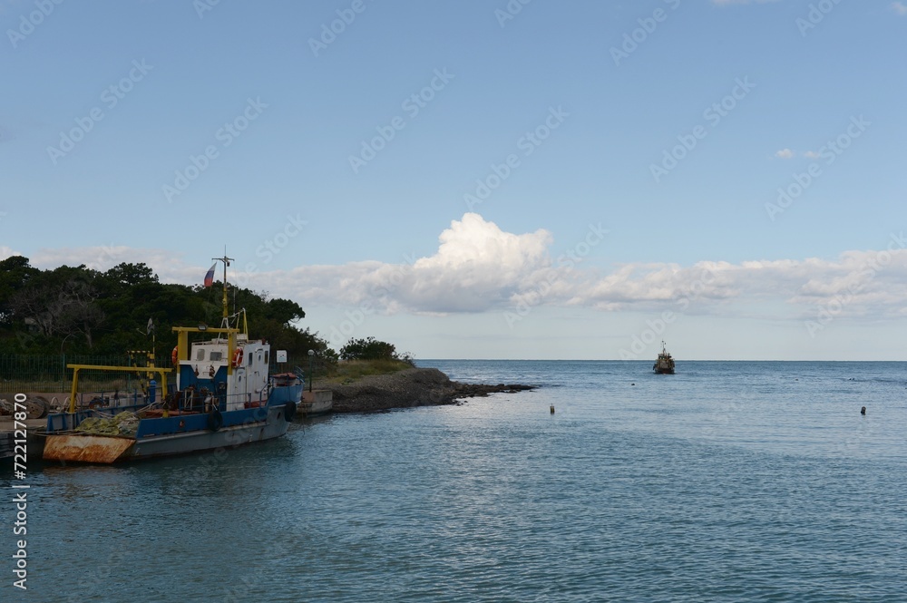 Fishing boats in the early morning at the exit from Snake Lake to the Black Sea. Krasnodarskiy kray Fishing boats in the early morning at the exit from Snake Lake to the Black Sea. Krasnodarskiy kray