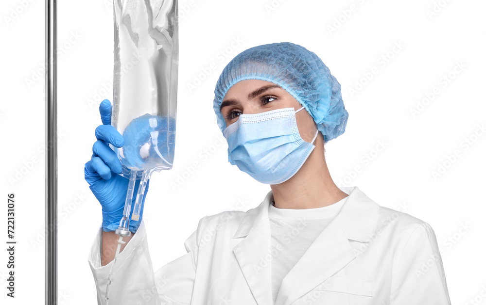 Nurse setting up IV drip on white background Nurse setting up IV drip on white background