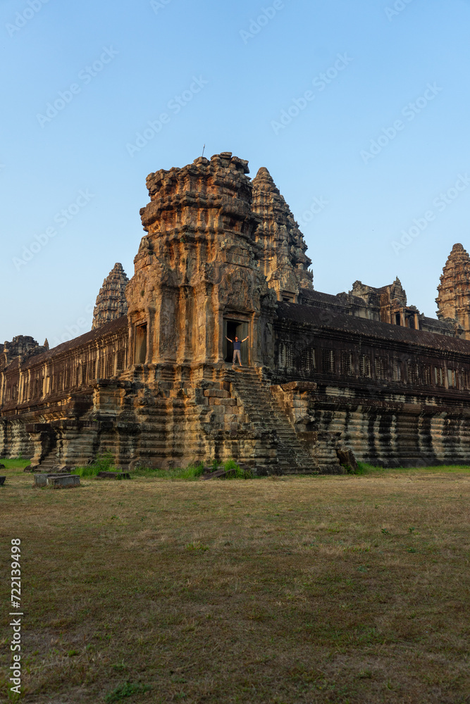 Ancient temple at dusk with the silhouette of its intricate architecture.