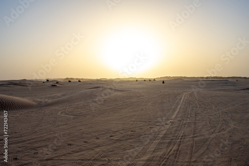 Beautiful sunset over Sahara desert in Douz, Tunisia. Sand and dunes against sky