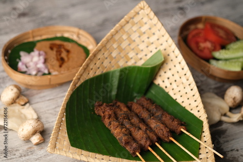 Vászonkép Sate Jamur, is a satay made from oyster mushrooms and edible mushrooms grilled with peanut sauce
