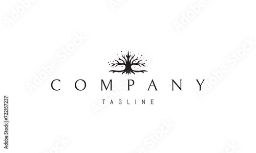 A vector logo with an abstract image of a mighty tree with roots.