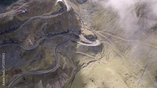 Curvy mountain road drone reveal