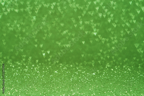 Valentine day concept idea. Abstract green background. Heart. Bokeh.