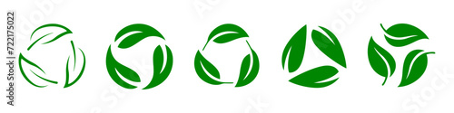 Leaf recycling symbol icon set. Biodegradable leaf recycling symbol set in green color. Recycling, reusing symbol in green color isolated on white background. photo