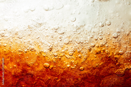 close-up cola background,Cola and Ice, food background, Cola close-up, design element. Beer. Macro bubbles, ice, bubbles, background, ice cubes, abstract background.