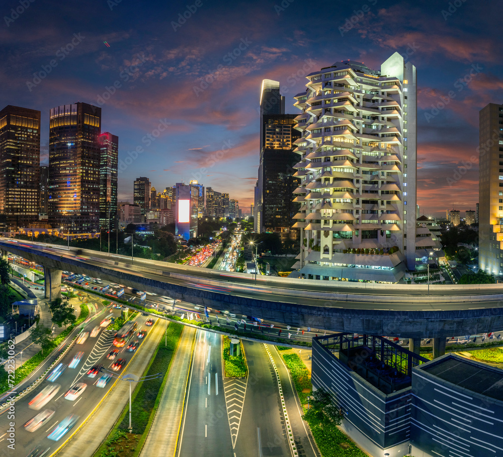 Fototapeta premium Panoramic view of jakarta City, Indonesia, with beautiful sunset. Jakarta is the largest city in indonesia that also the center of governance and business district. 