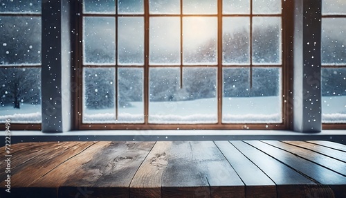 a table by a window with a view of a snowy landscape 