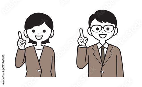 案内するスーツ姿の女性と男性