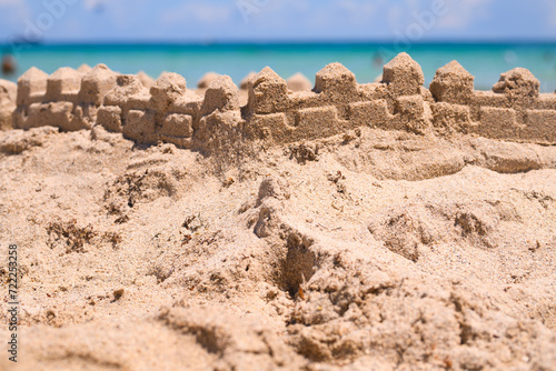 Sand castle. Summer vacation concept. Sand castle at beach.