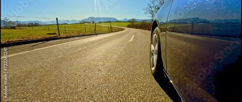 Anamorphic car POV: Bavarian Country road in early spring photo