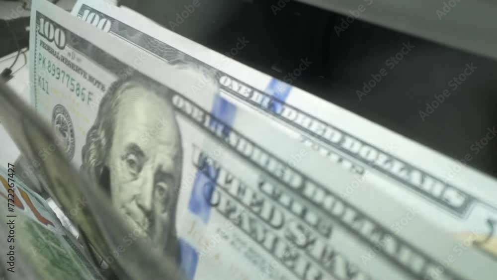 Cash money inside running banknotes counter. Banking and financial ...