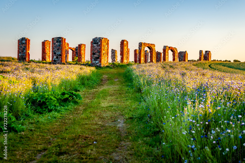 Ruins of an ancient building that looks like Stonehenge at sunrise. Smiltene, Latvia