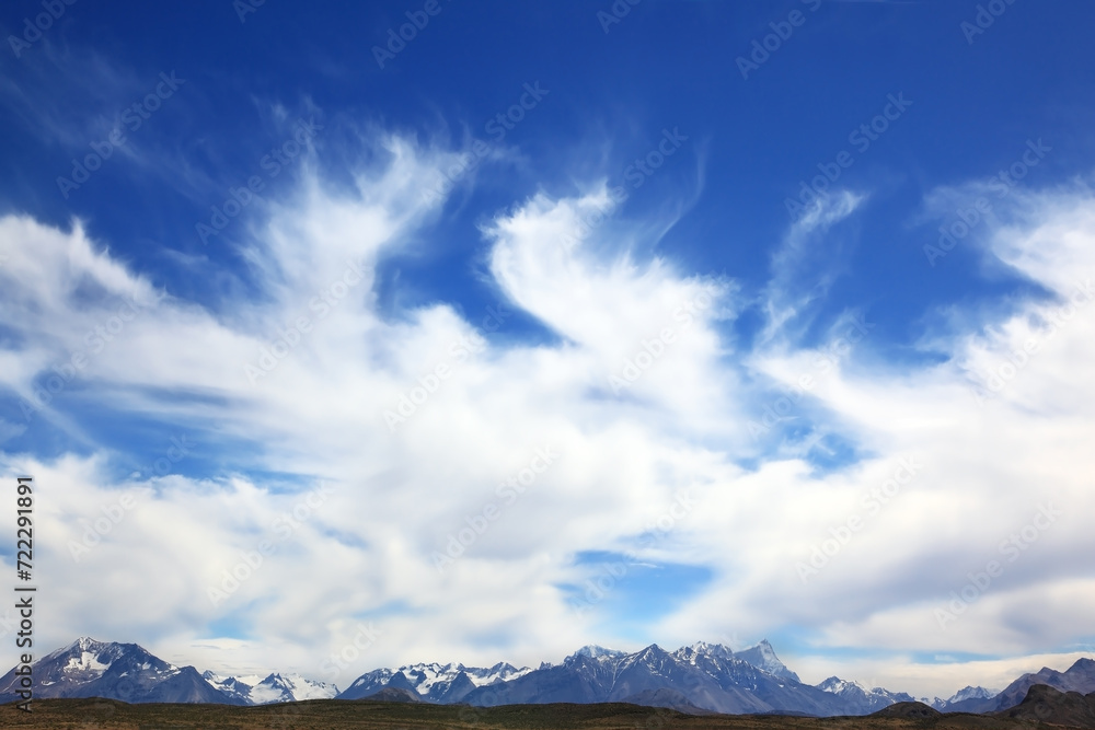  The clouds over snow-capped mountains