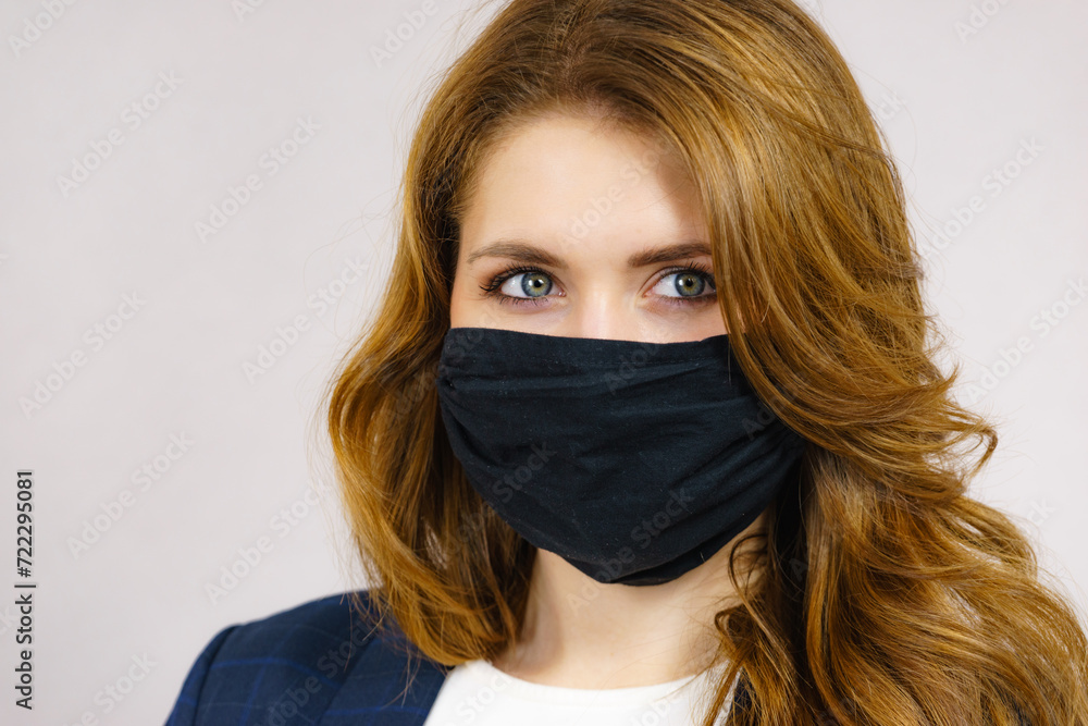 Woman using protective face mask. Woman using protective face mask.