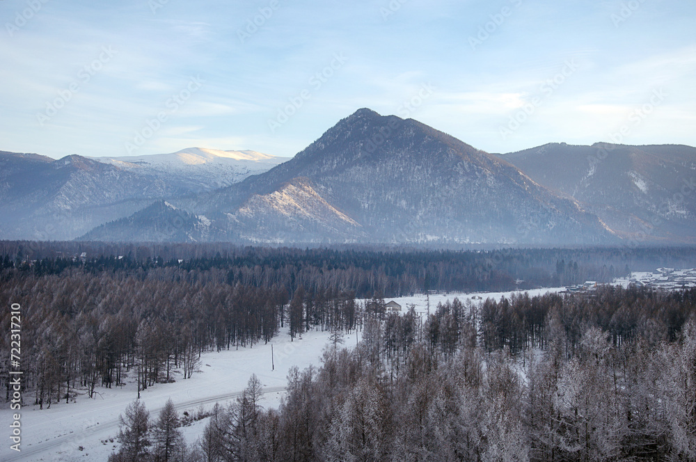 Cold snowy mountain landscape at sunset. Cold snowy mountain landscape at sunset.